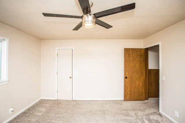 a view of a storage & utility room with wooden floor
