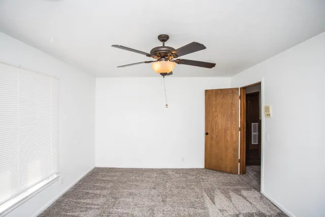 a view of a yard with a house