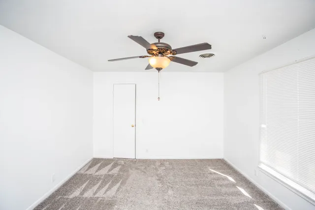 a view of a pathway along a building