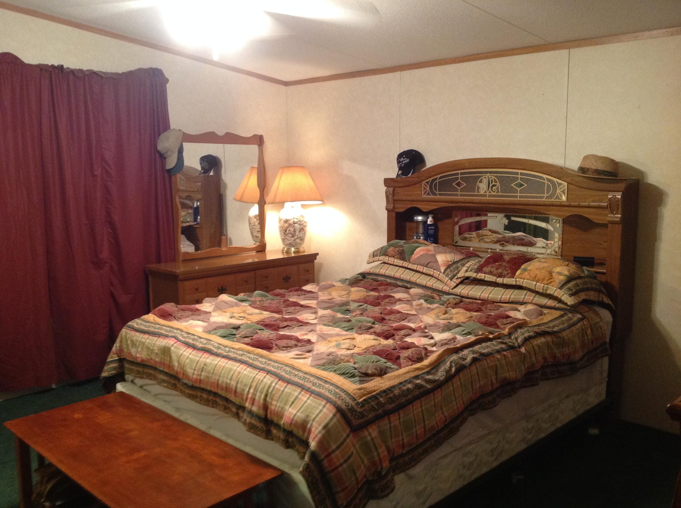 1763 Harmony School Road Hardy, VA 24101 - Photo 4 of 11 a bedroom with a bed and a window