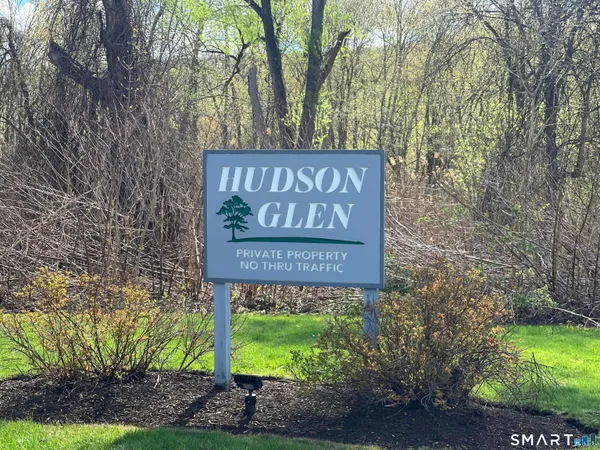 a sign on the side of the road