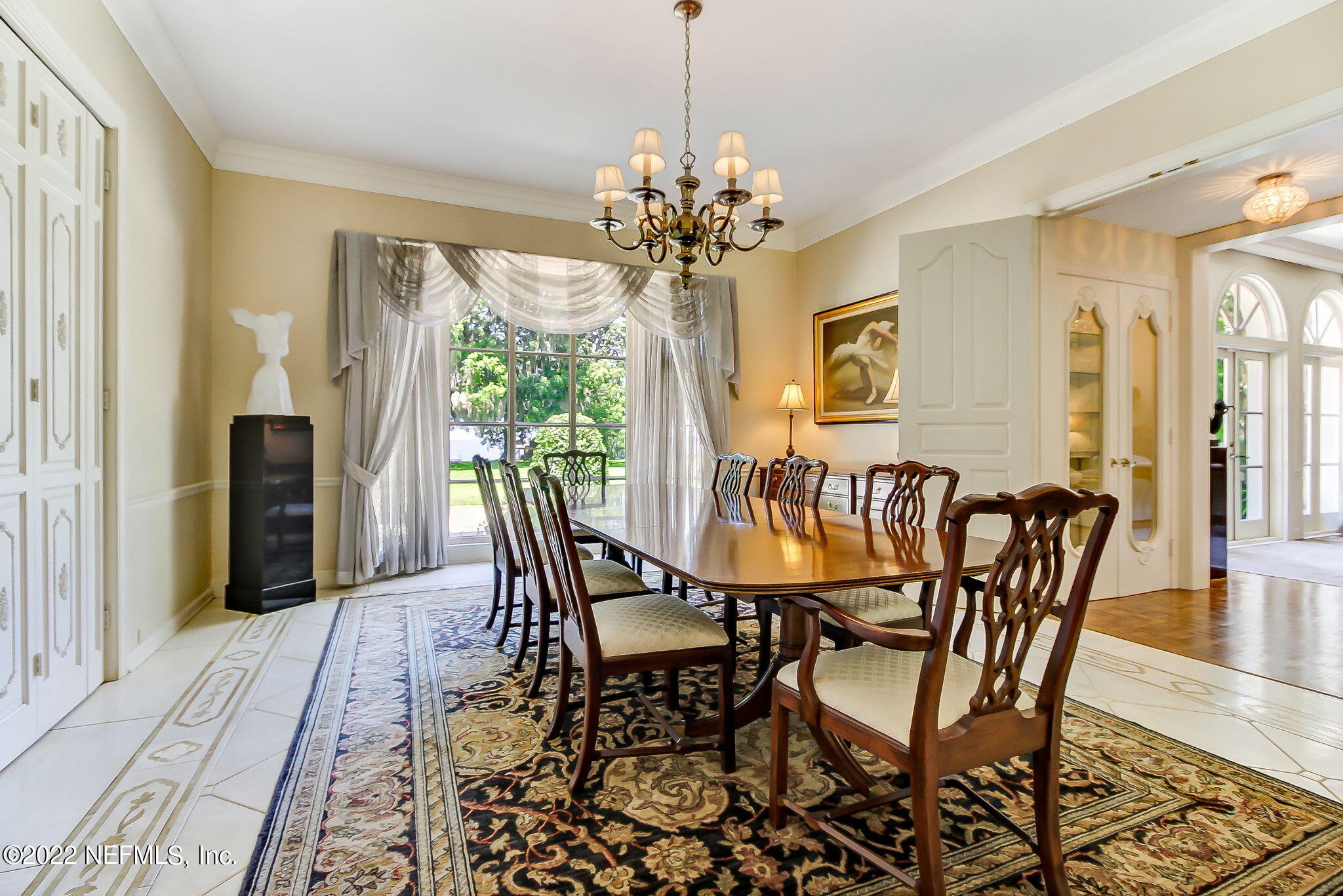 3520 Point Pleasant Road Jacksonville, FL 32217 - Photo 14 of 37 a view of a dining room with furniture window and wooden floor