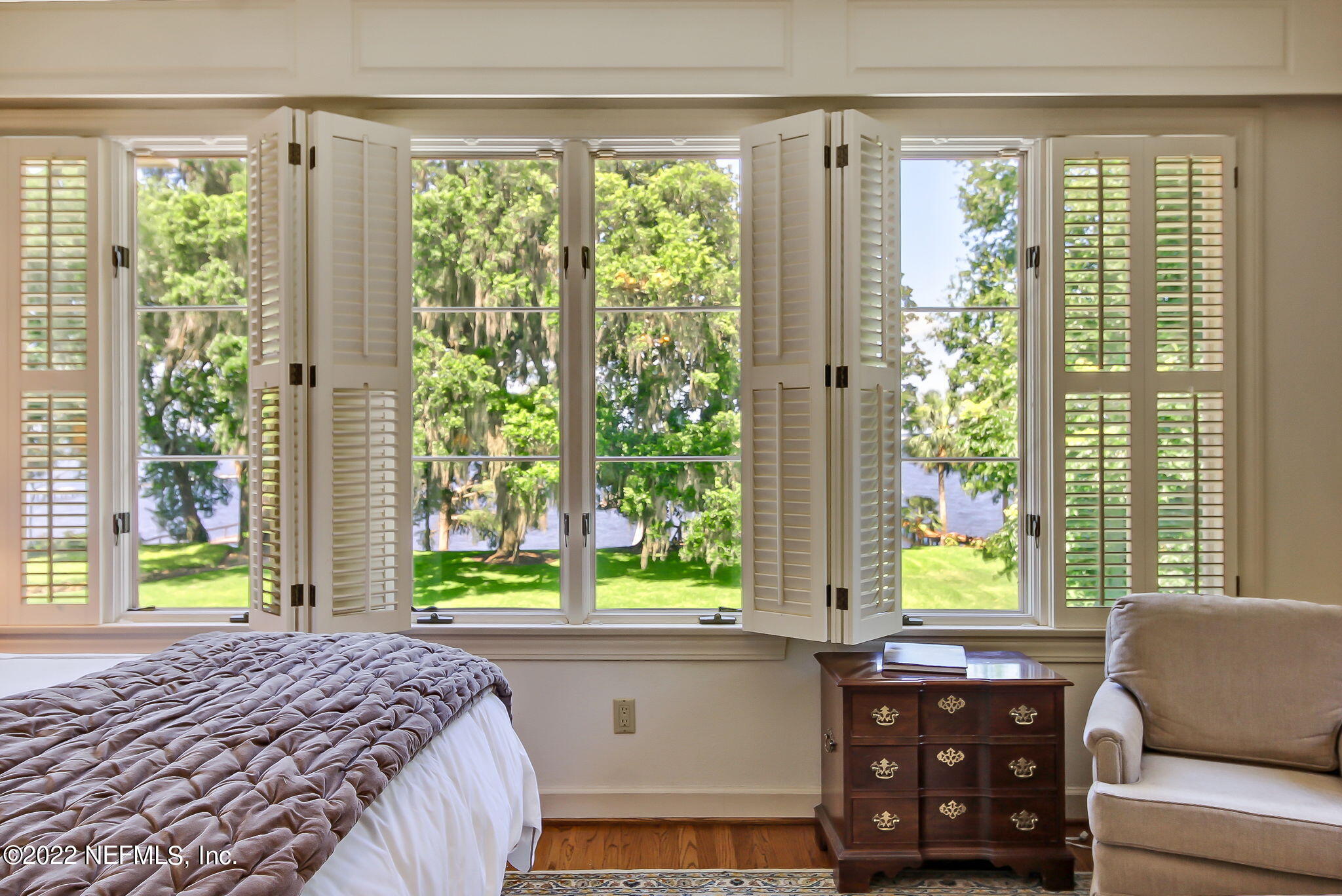 3520 Point Pleasant Road Jacksonville, FL 32217 - Photo 24 of 37 a bedroom with a bed and large windows