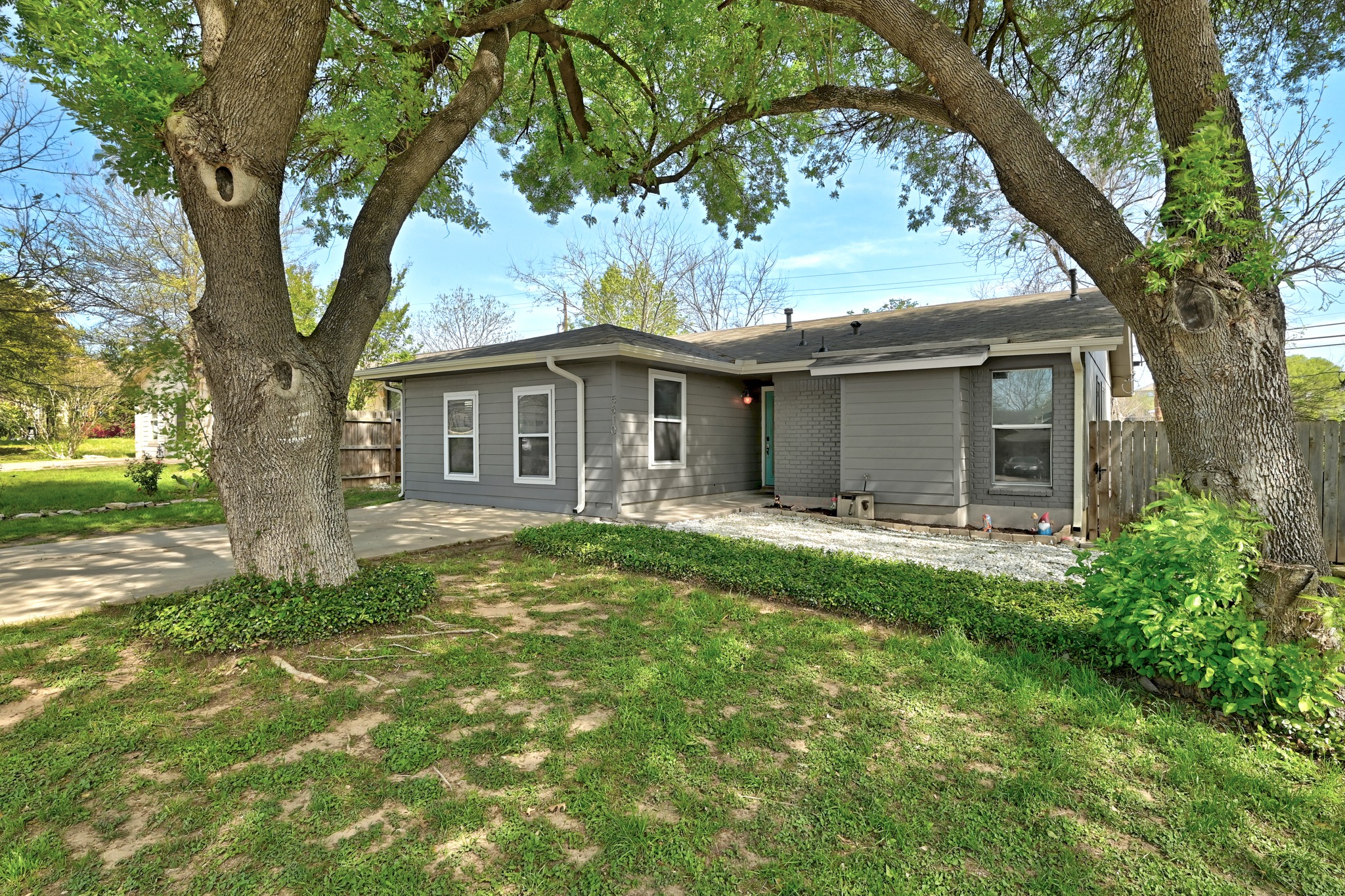 5610 Fence Row Austin, TX 78744 - Photo 1 of 26 Come on inside! Check out those lovely mature trees to shade you in the TX heat.