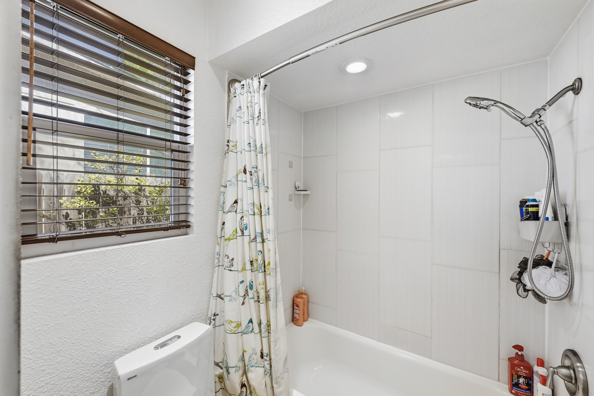 5610 Fence Row Austin, TX 78744 - Photo 15 of 26 The tub (and toilet) have a separate room! Great for privacy.