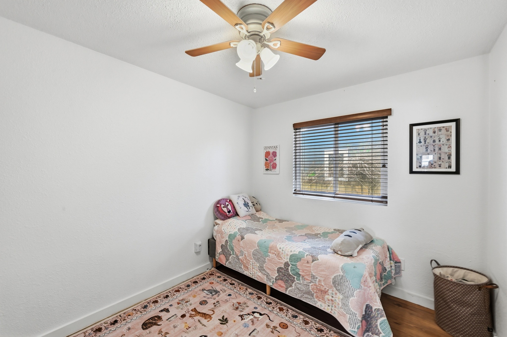 5610 Fence Row Austin, TX 78744 - Photo 19 of 26 Sweet bedroom, with a ceiling fan.