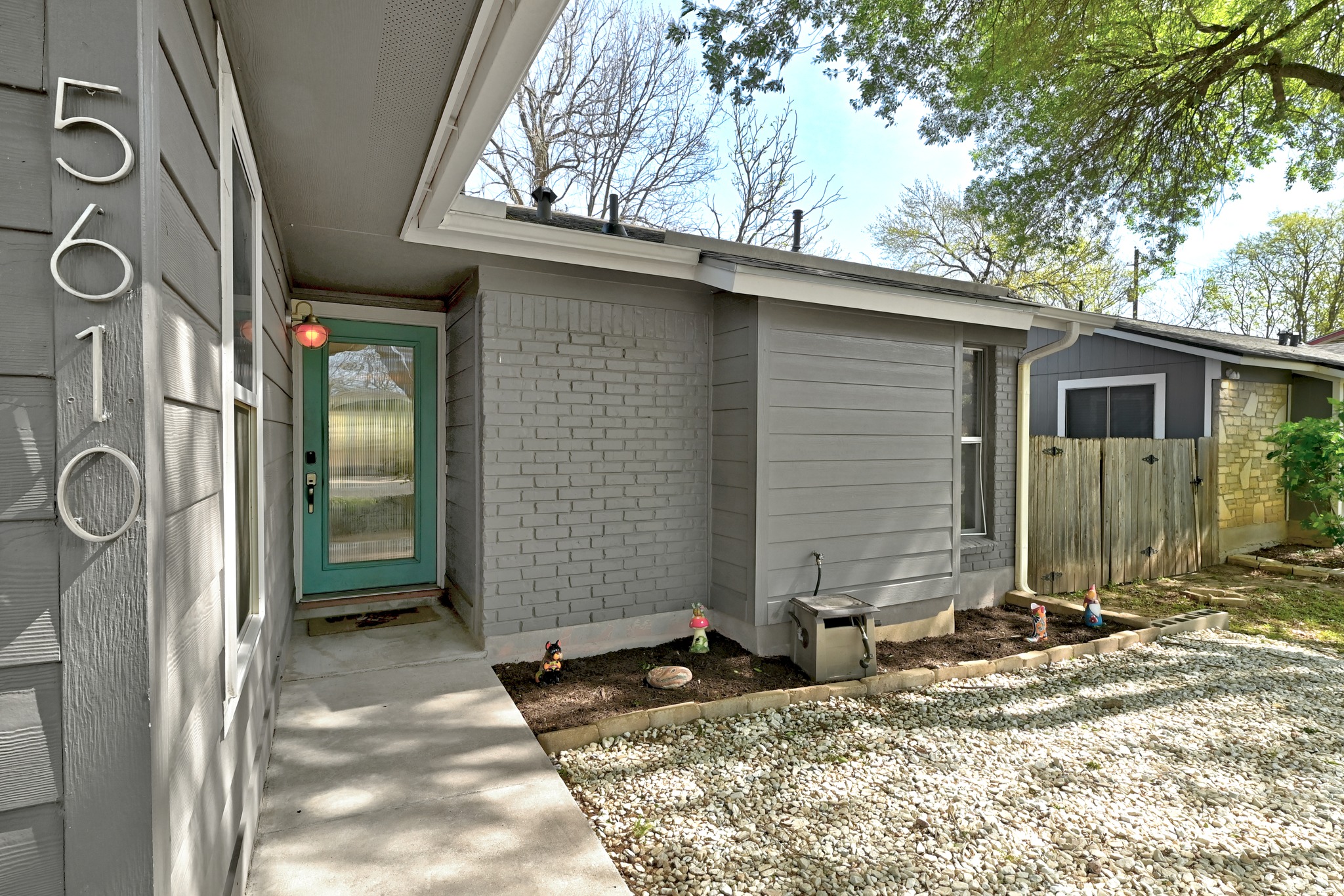 5610 Fence Row Austin, TX 78744 - Photo 26 of 26 Modern house numbers and entry door.