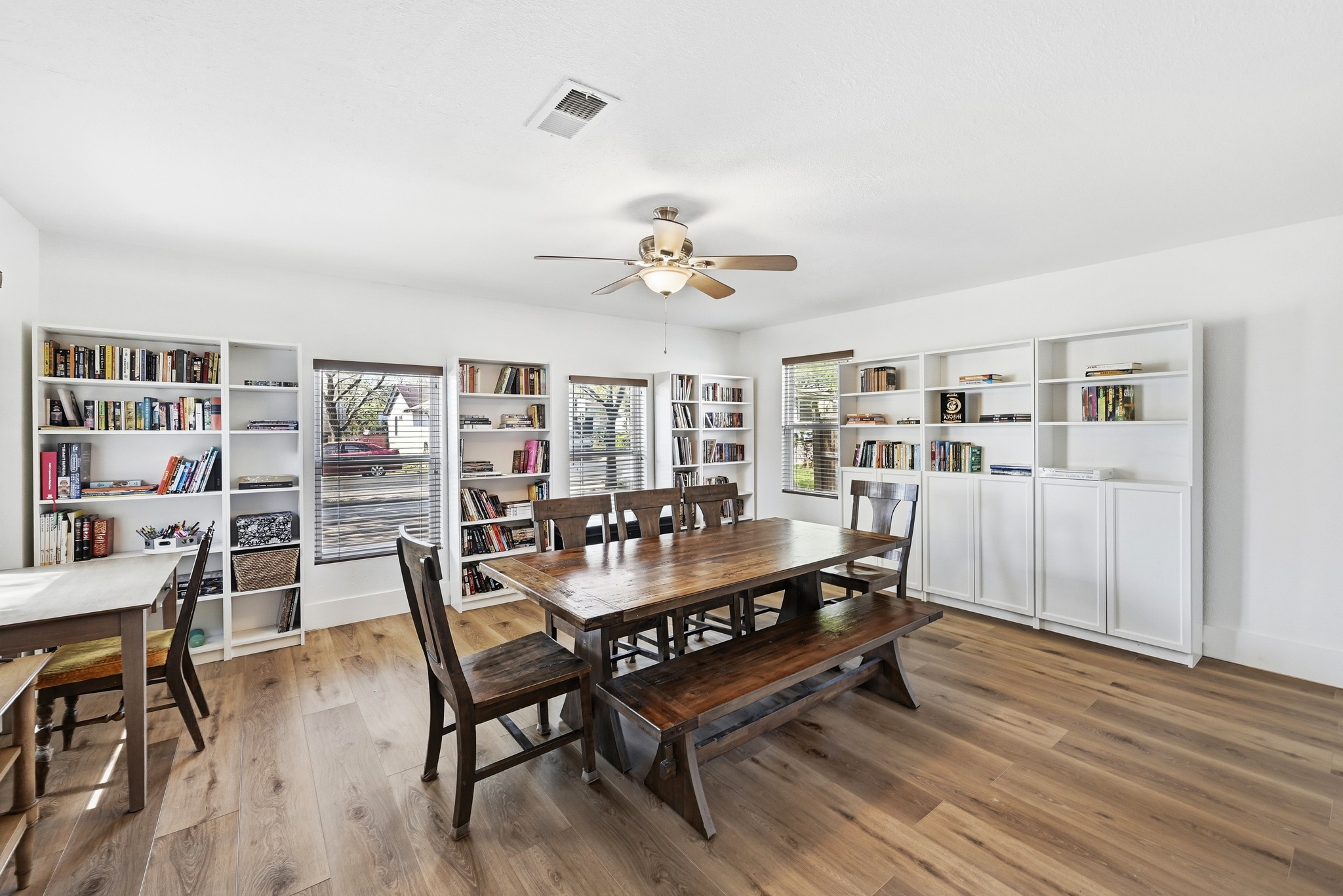 5610 Fence Row Austin, TX 78744 - Photo 6 of 26 While technically the 4th bedroom, this room is being used as a huge dining/library/game room! The possibilities this space are endless!