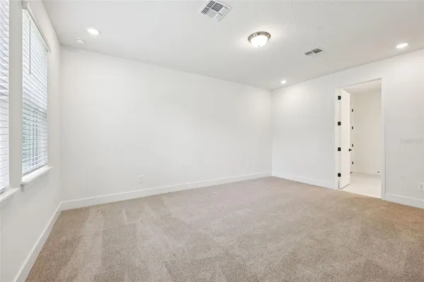 a view of a room with racks on the wall