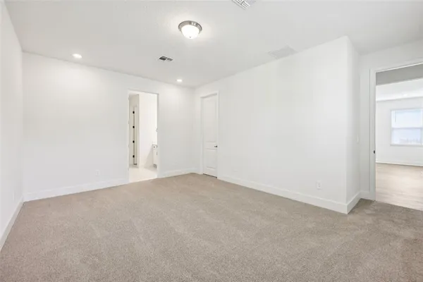 a bathroom with a double vanity sink mirror and double