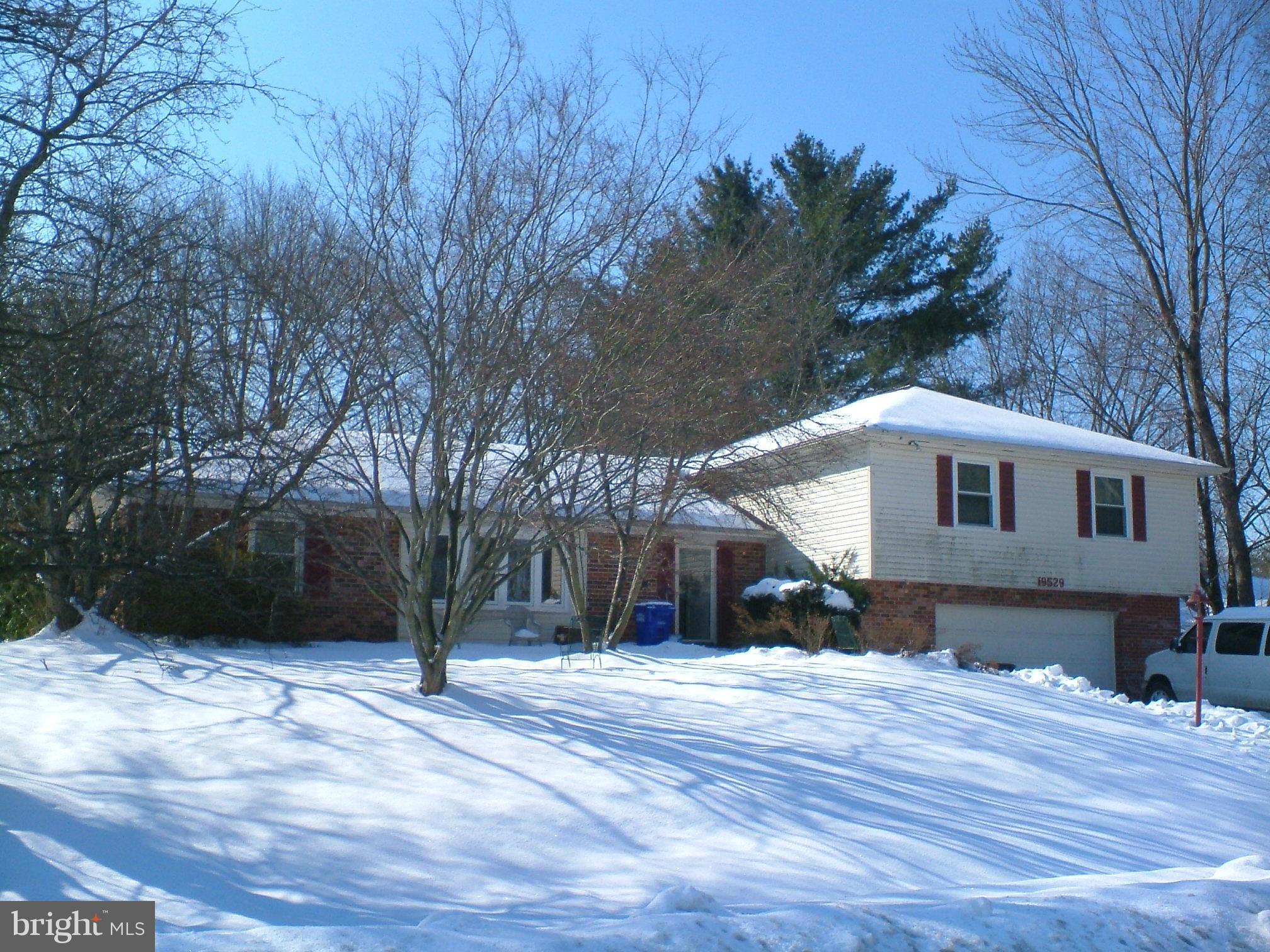 19529 Olney Mill Road Olney, MD 20832 - Photo 1 of 10 a front view of a house with a yard