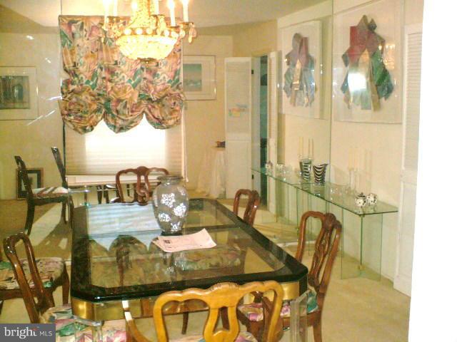 19529 Olney Mill Road Olney, MD 20832 - Photo 2 of 10 a dining room with furniture and wooden floor