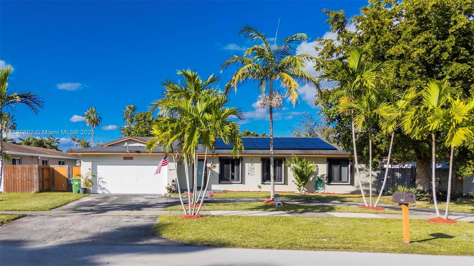 8111 Southwest 205th Street Cutler Bay, FL 33189 - Photo 25 of 51 a view of a house with garden and sitting area