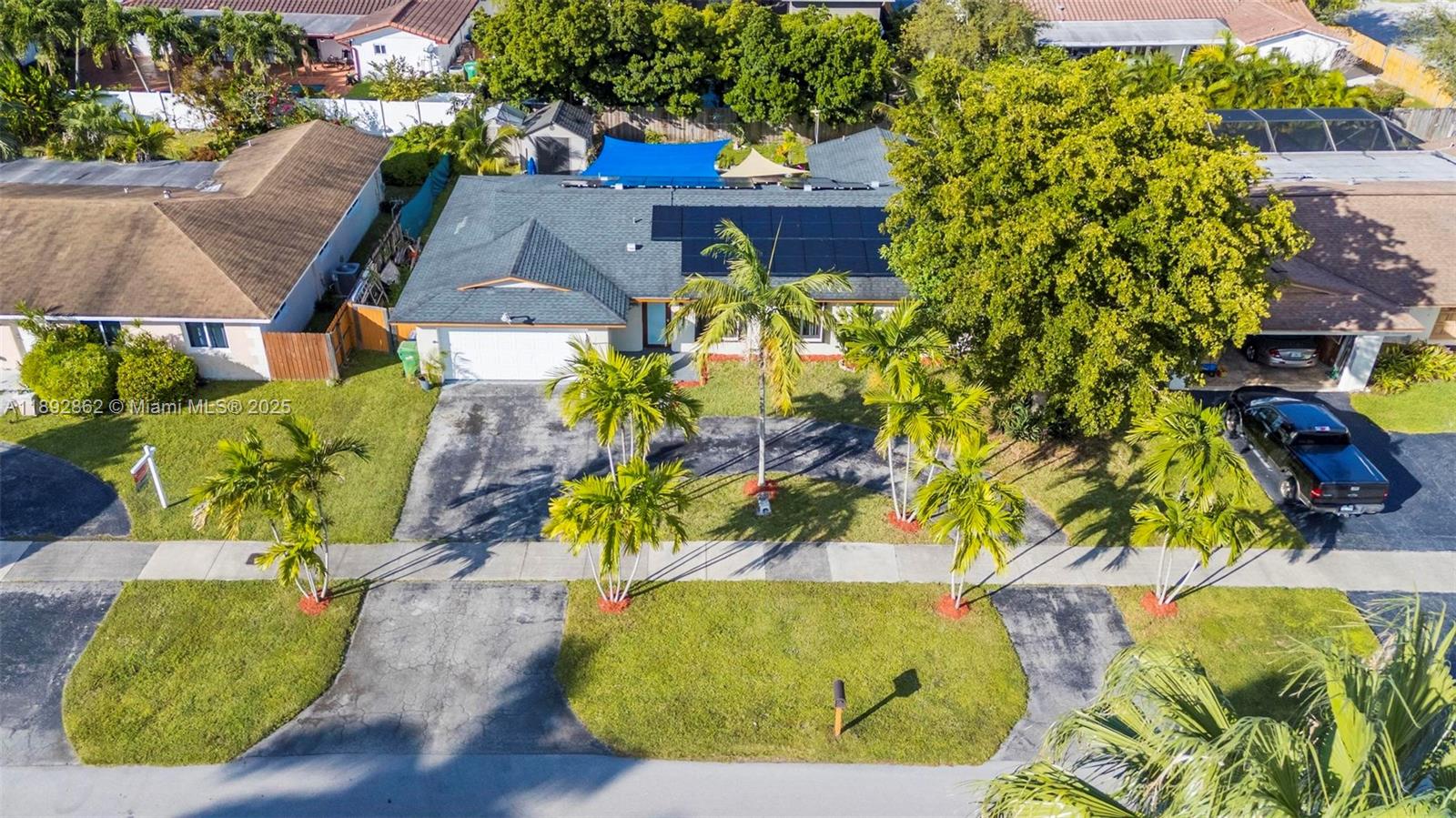 8111 Southwest 205th Street Cutler Bay, FL 33189 - Photo 29 of 51 a view of outdoor space and garden