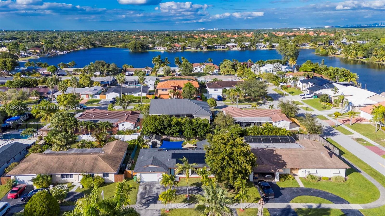 8111 Southwest 205th Street Cutler Bay, FL 33189 - Photo 31 of 51 an aerial view of residential house with outdoor space and swimming pool