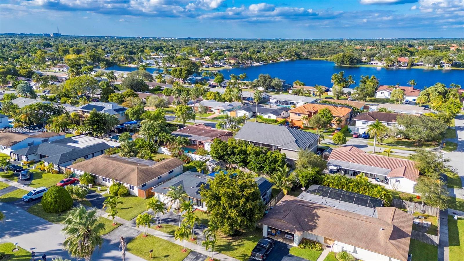 8111 Southwest 205th Street Cutler Bay, FL 33189 - Photo 32 of 51 an aerial view of residential houses with outdoor space