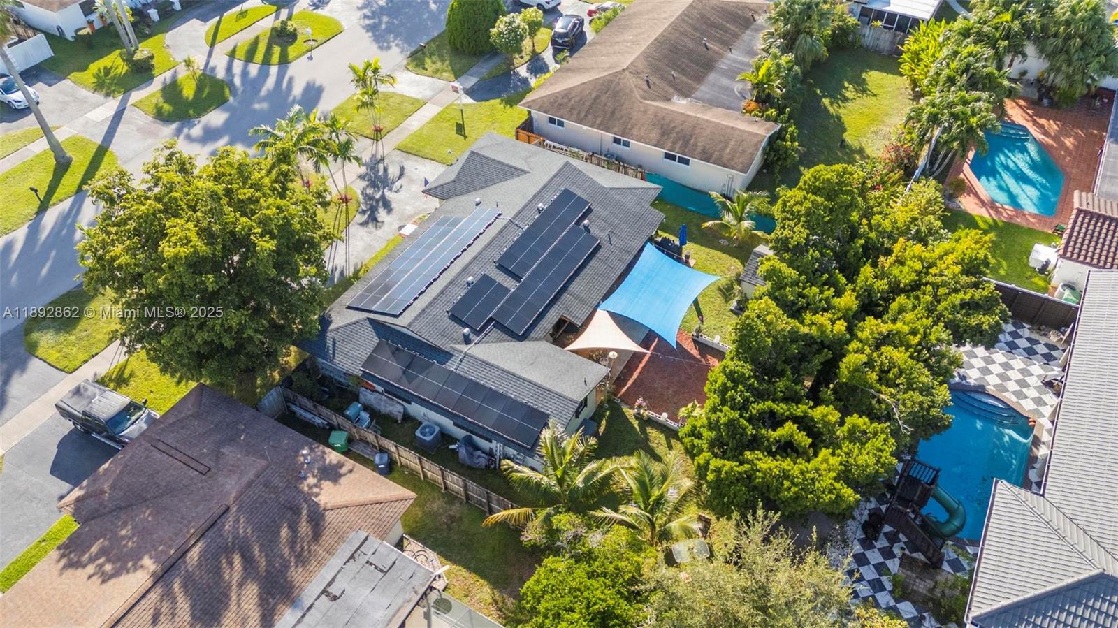 8111 Southwest 205th Street Cutler Bay, FL 33189 - Photo 34 of 51 a view of a house with a garden