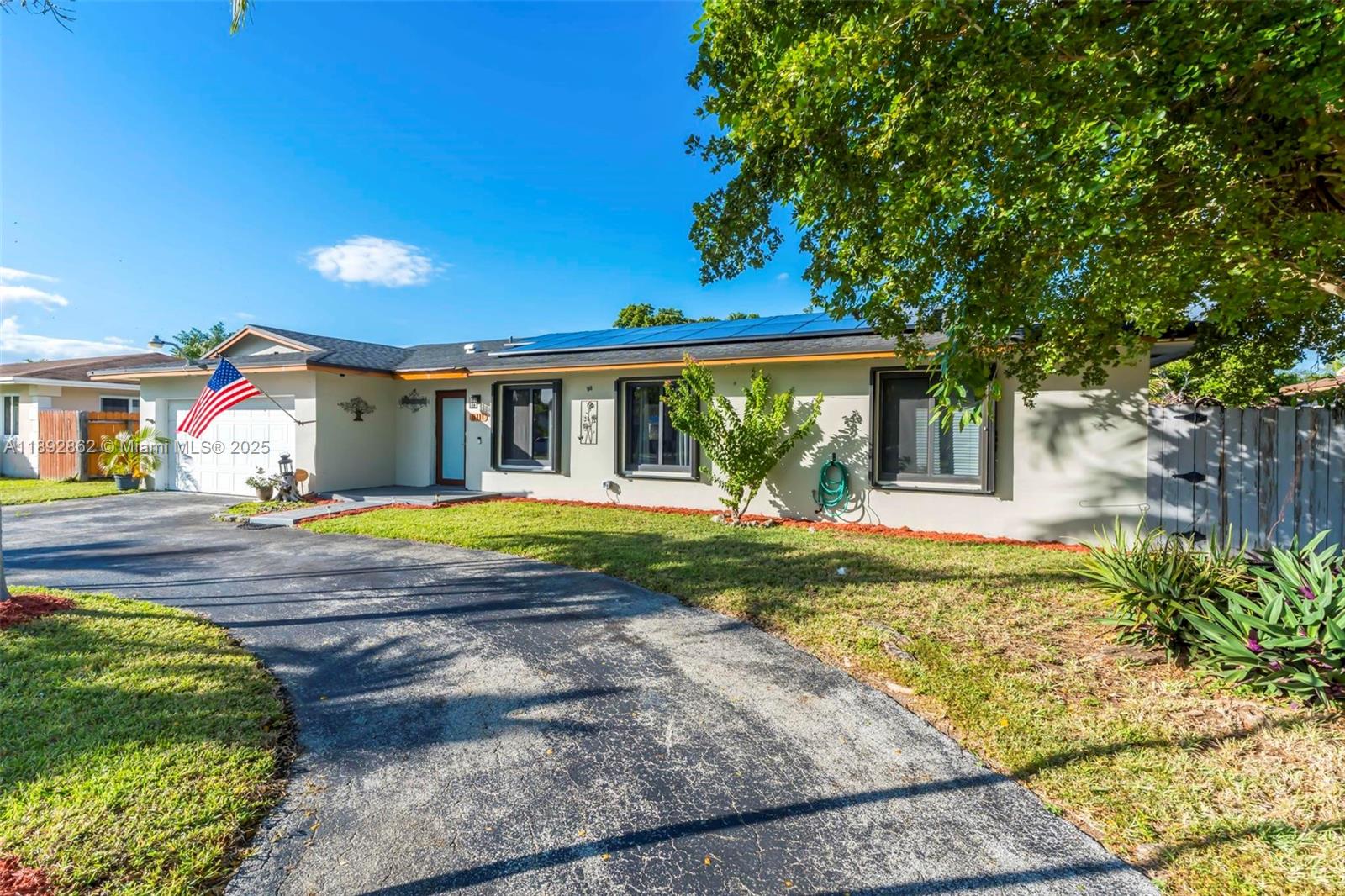 8111 Southwest 205th Street Cutler Bay, FL 33189 - Photo 43 of 51 a view of house with garden and swimming pool