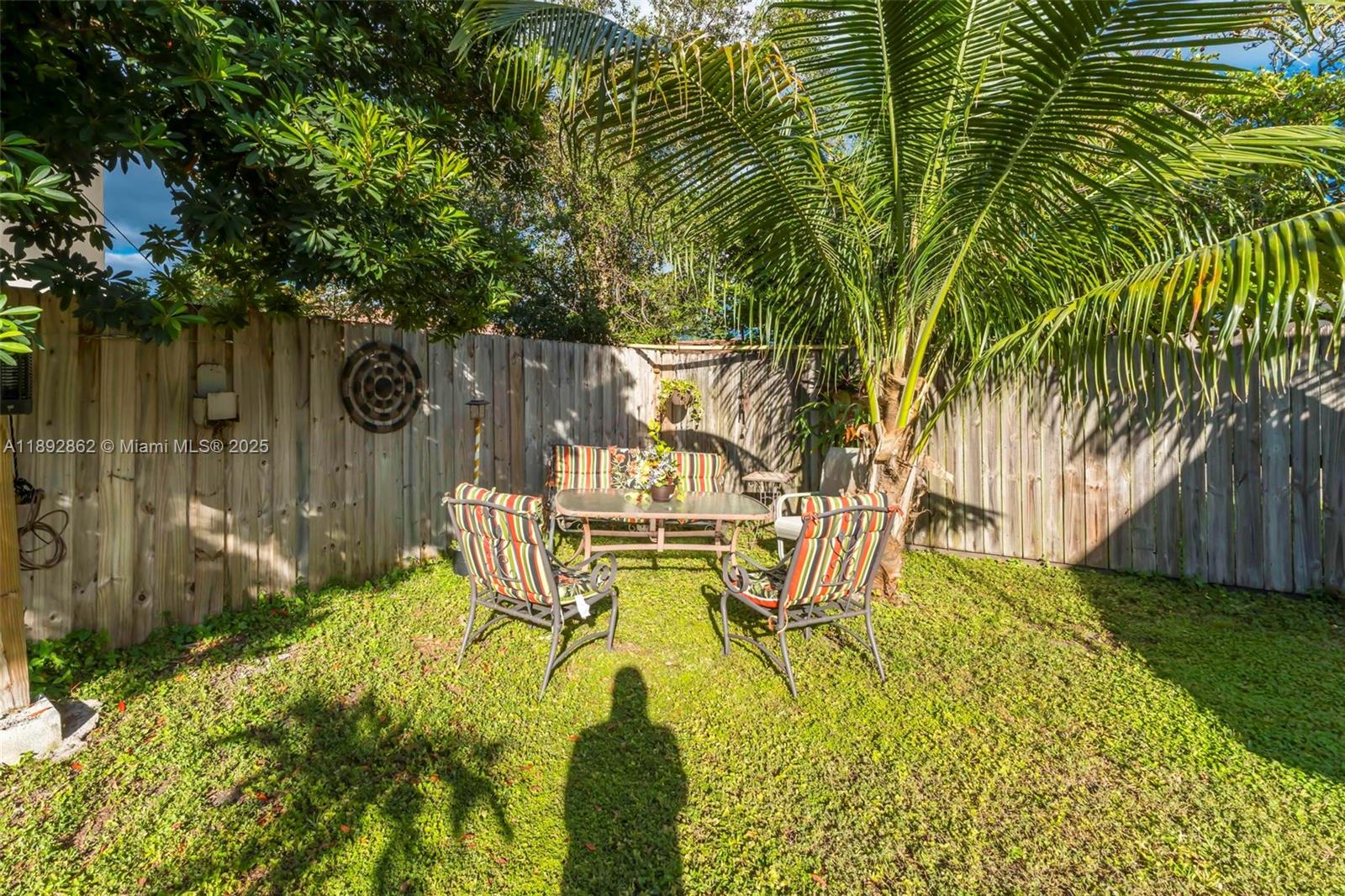 8111 Southwest 205th Street Cutler Bay, FL 33189 - Photo 48 of 51 a view of an chairs and table in the patio