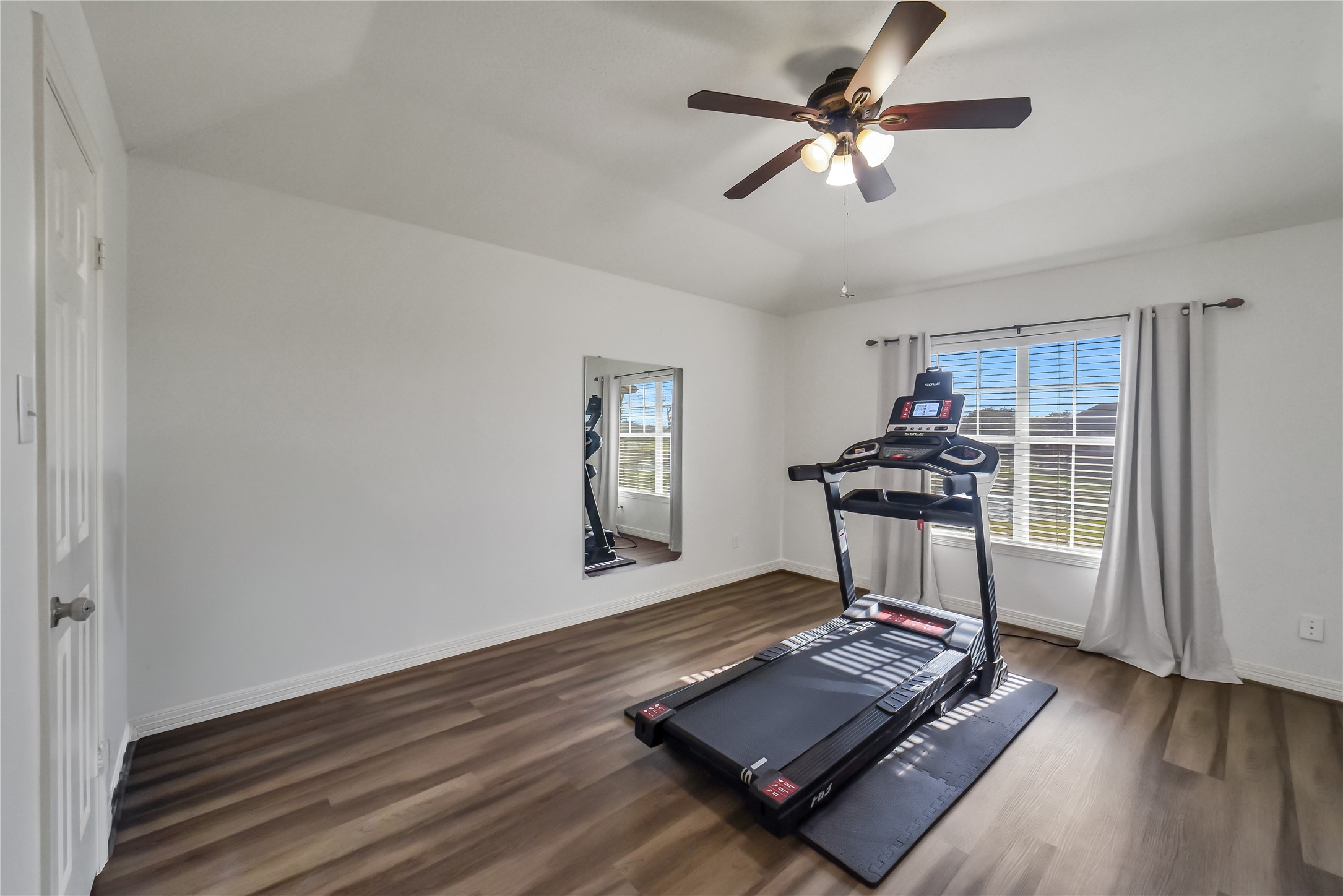 24403 Falcon Point Drive Katy, TX 77494 - Photo 23 of 32 Versatile bright secondary bedroom currently utilized as a home gym.