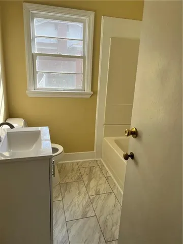 a bathroom with a sink and a vanity