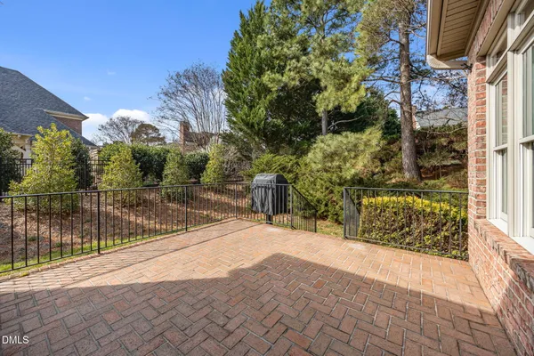 a view of a backyard of the house