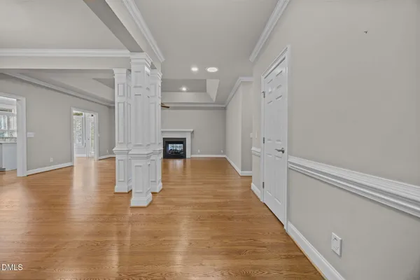 a view of kitchen with furniture and wooden floor
