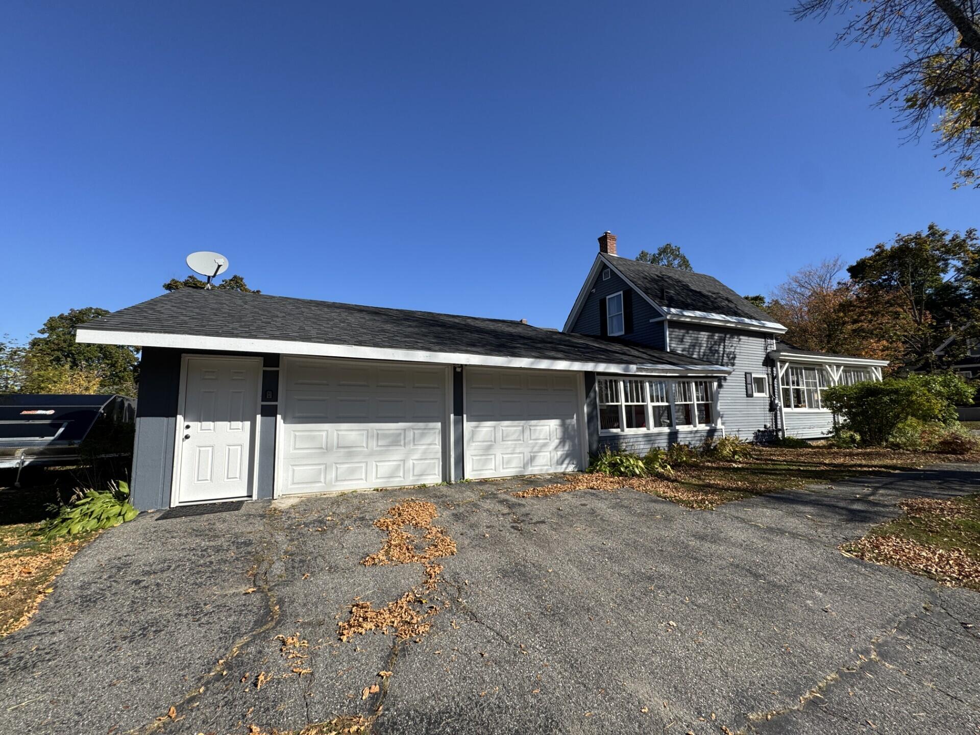 75 Elm Street Millinocket, ME 04462 - Photo 2 of 37 Large two-bay attached garage