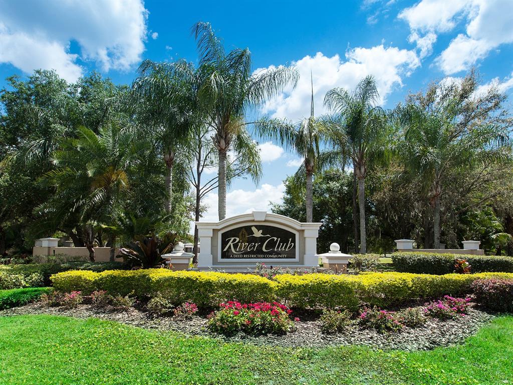 10528 Cheval Place Lakewood Ranch, FL 34202 - Photo 71 of 71 a view of a park with of a house in the background