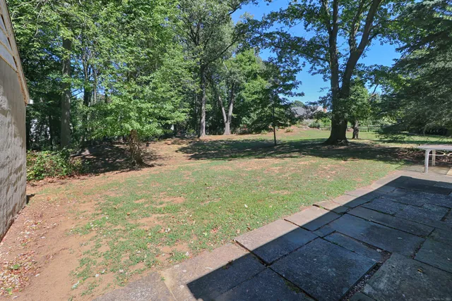 a view of a yard with an outdoor space