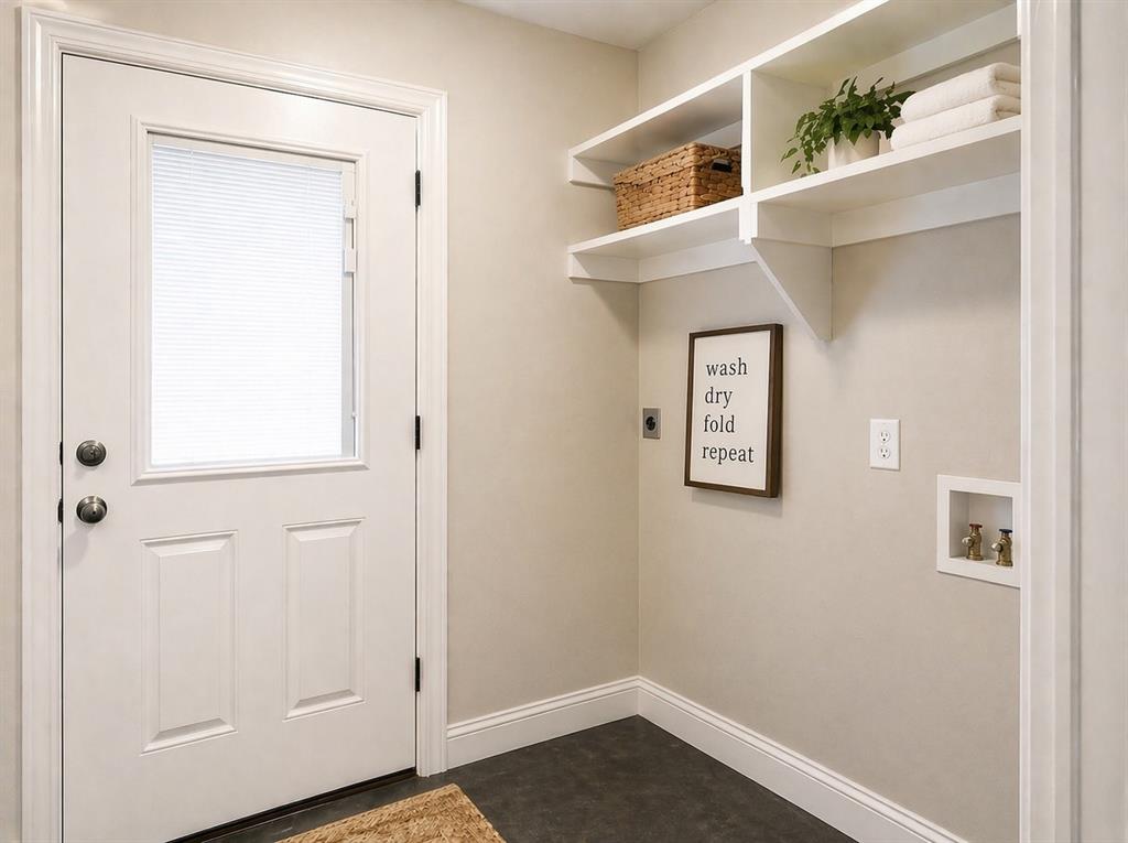 212 East Walker Street Denison, TX 75021 - Photo 11 of 12 Dedicated laundry and Pantry area, a recessed utility box with hookups. Door to the backyard