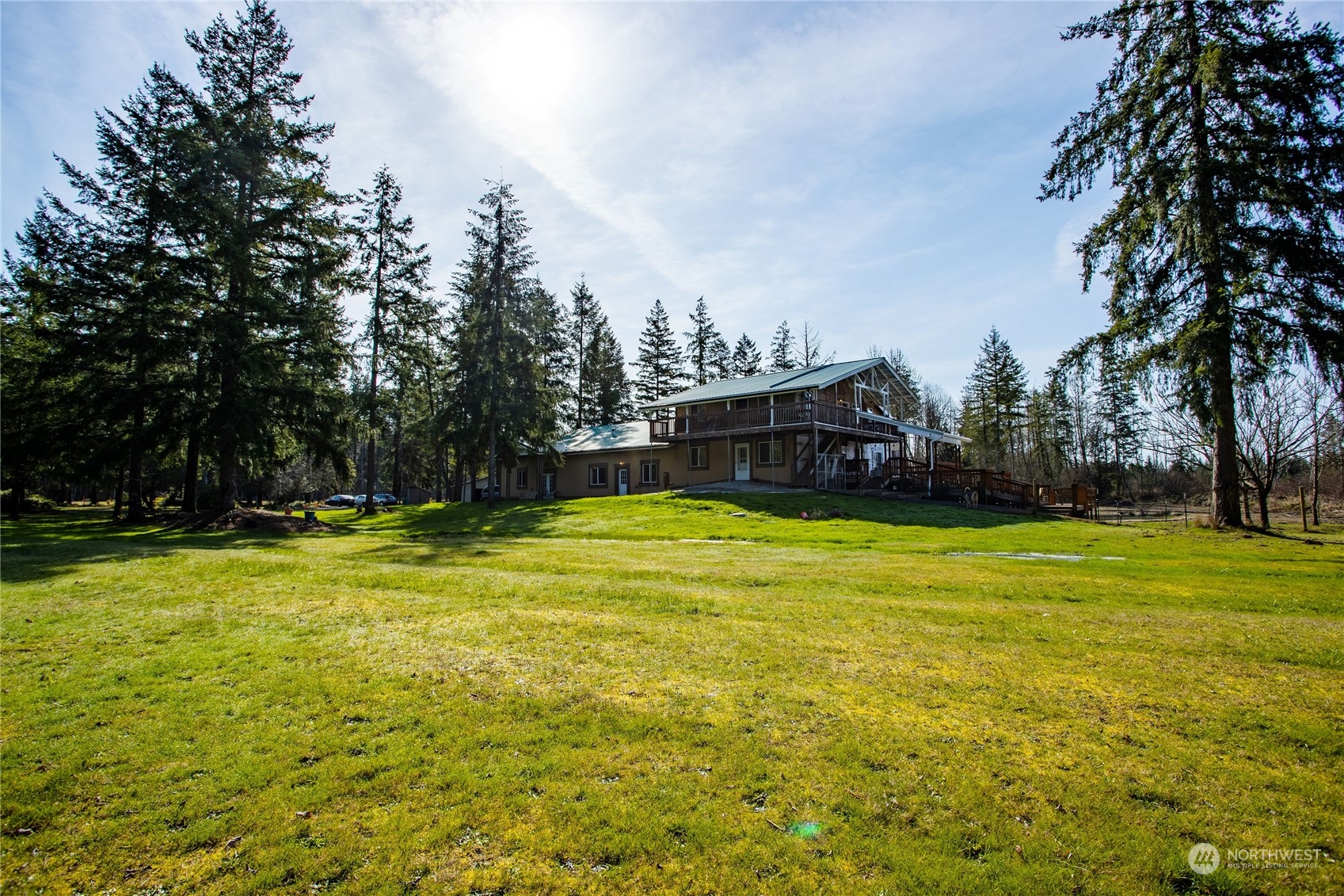 411 Zandecki Road Chehalis, WA 98532 - Photo 4 of 40 a view of a swimming pool with a yard and trees