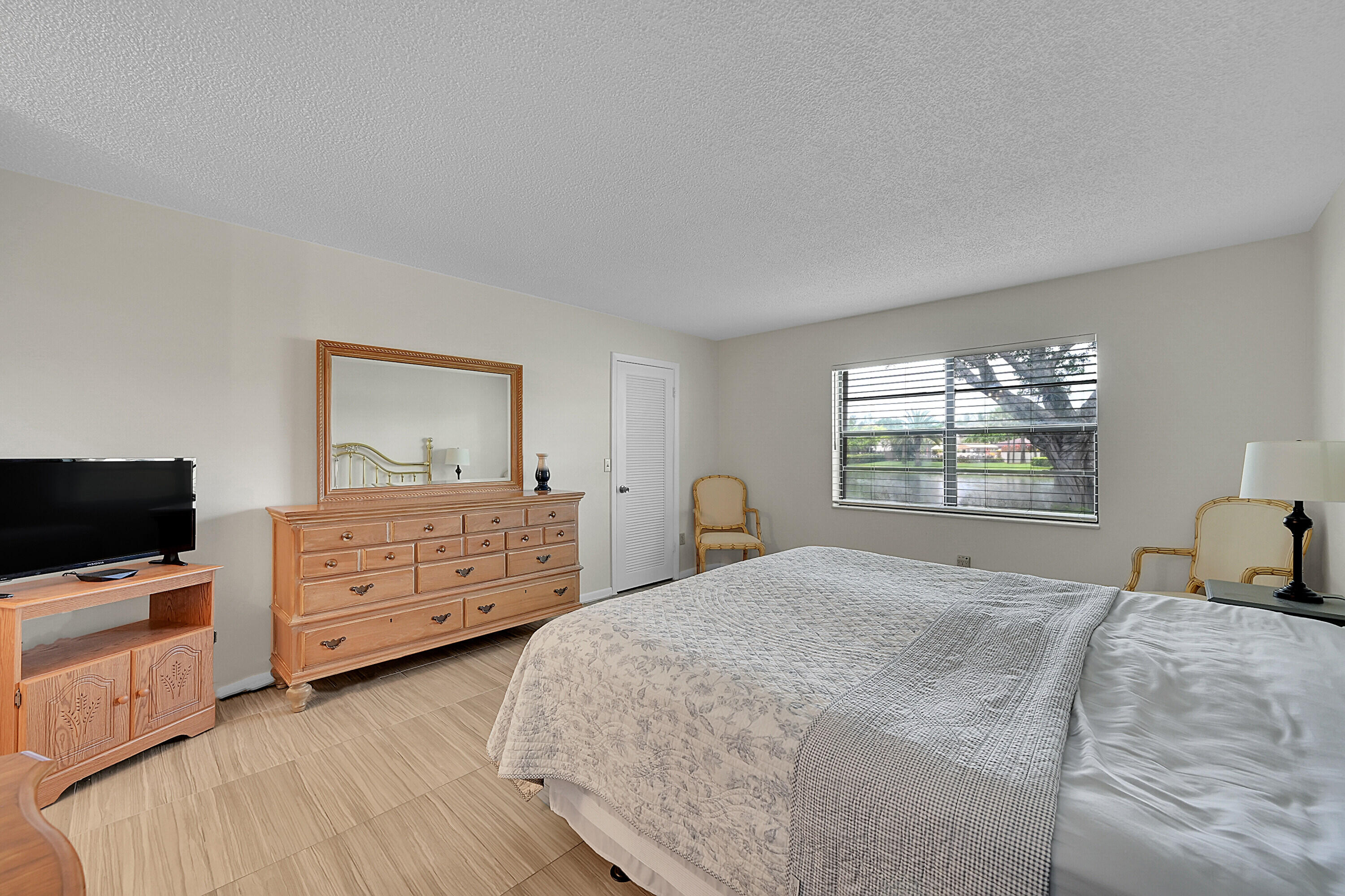 9261 Vista Del Lago, Unit A Boca Raton, FL 33428 - Photo 13 of 25 14_primary bedroom