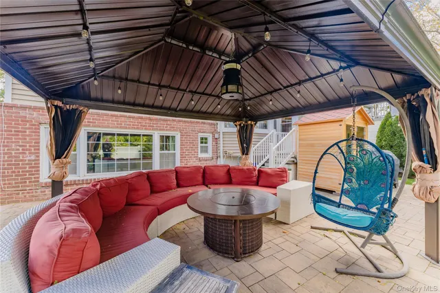 a outdoor living space with furniture