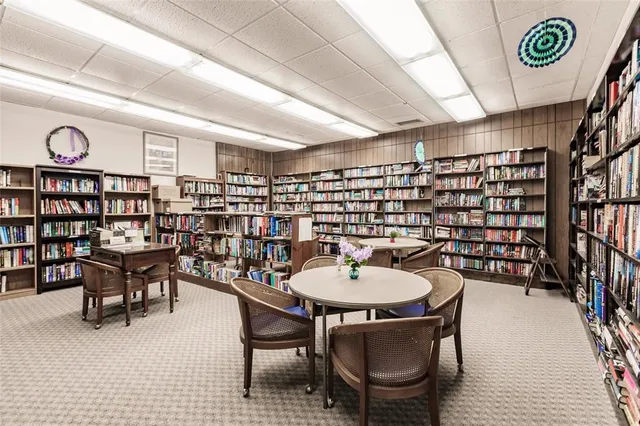 a dining room with a table and chairs