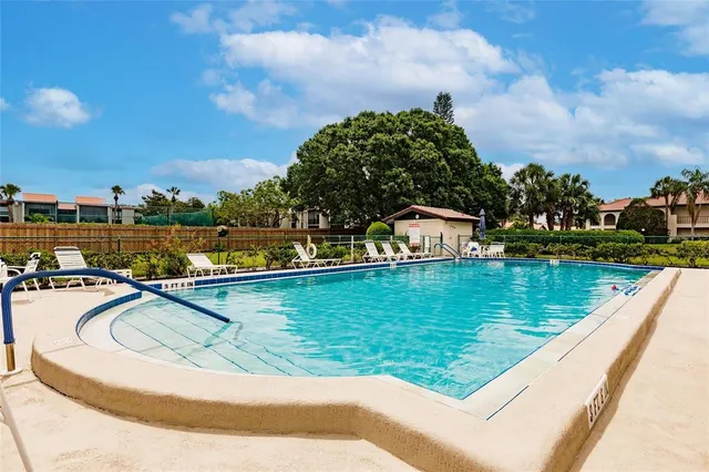 a view of a dinning table and chairs in the patio