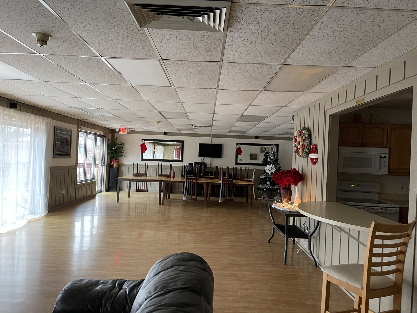 9-s116 S Frontage Road, Unit 27104 Darien, IL 60527 - Photo 14 of 15 a living room with furniture and a flat screen tv