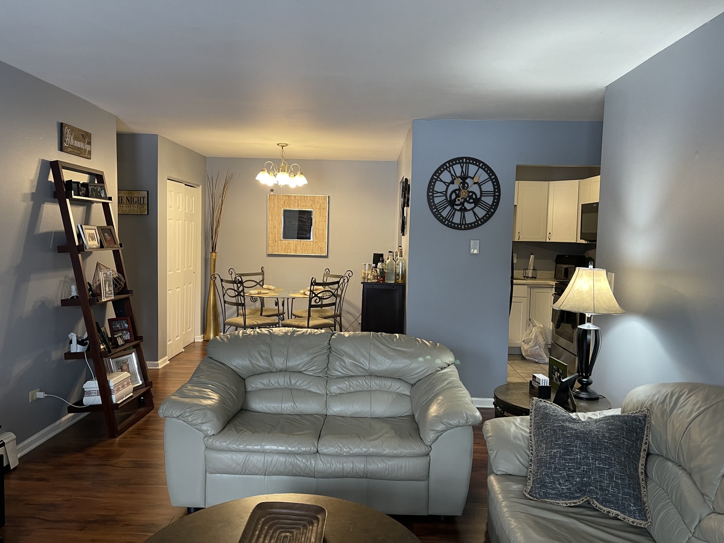 9-s116 S Frontage Road, Unit 27104 Darien, IL 60527 - Photo 6 of 15 a bedroom with a bed and a lamp