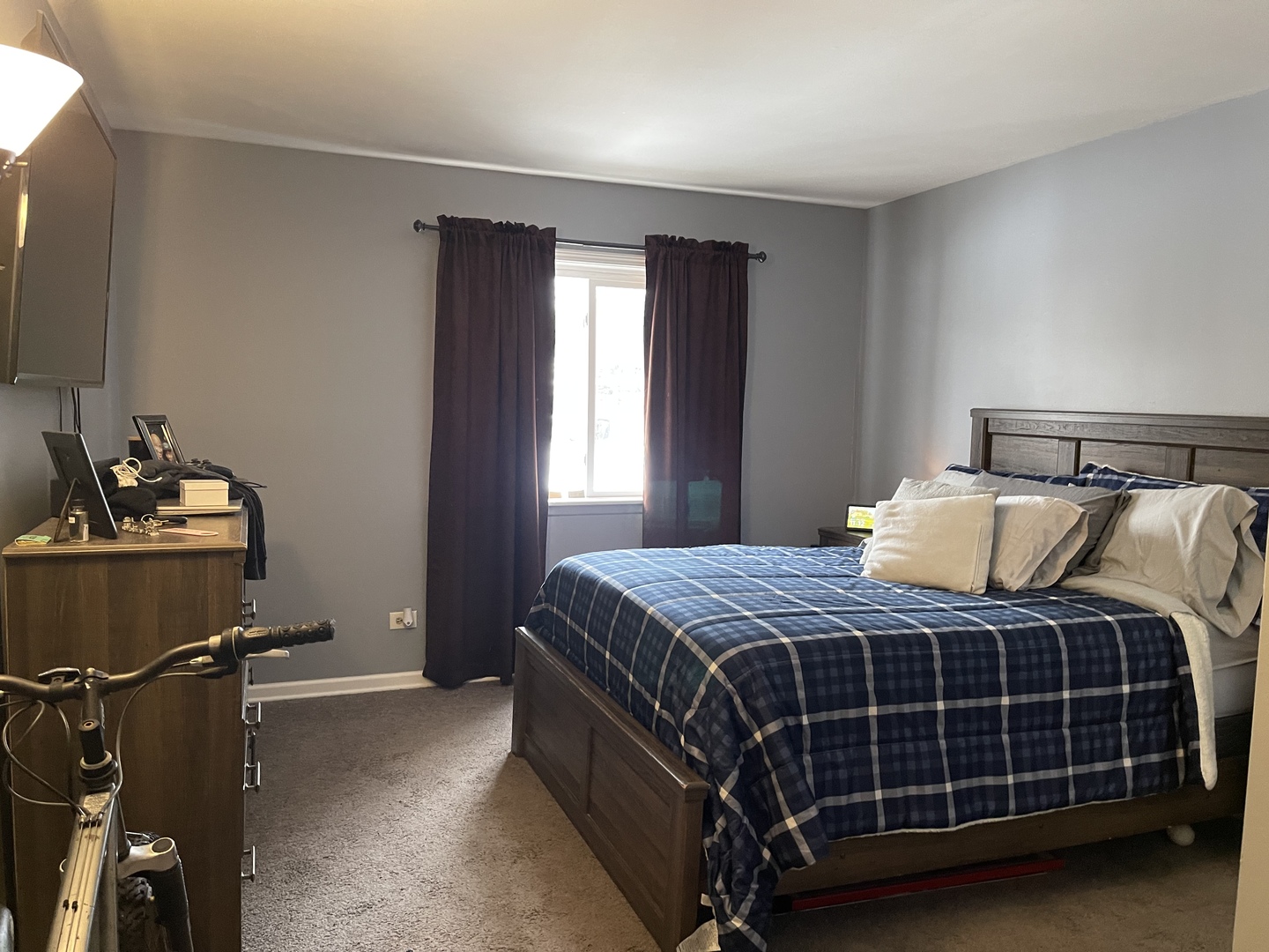 9-s116 S Frontage Road, Unit 27104 Darien, IL 60527 - Photo 8 of 15 a bedroom with a bed and a window