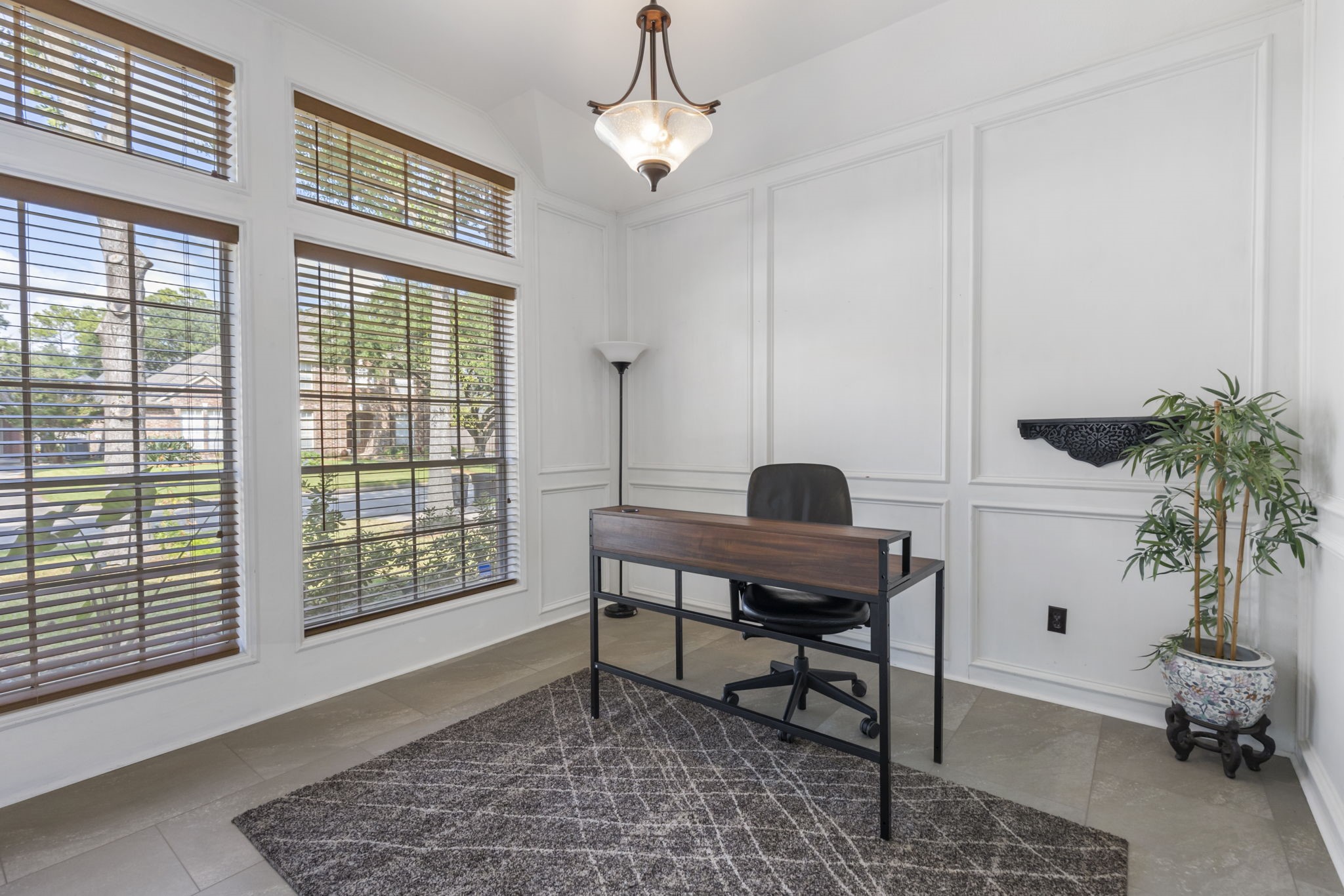 3427 Rolling Terrace Drive Spring, TX 77388 - Photo 18 of 36 a view of a workspace with furniture and a window