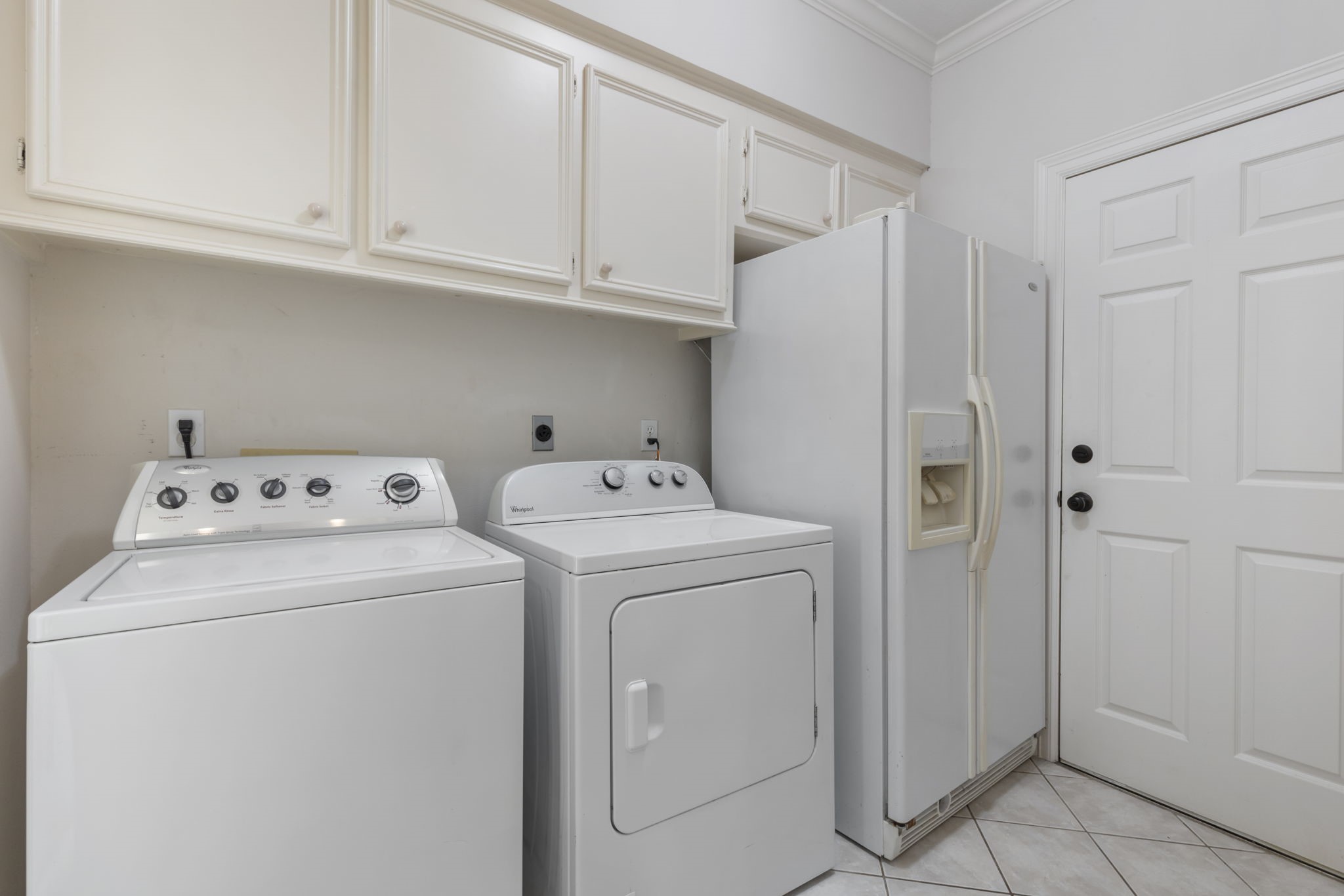 3427 Rolling Terrace Drive Spring, TX 77388 - Photo 22 of 36 a view of storage and utility room with washer and dryer