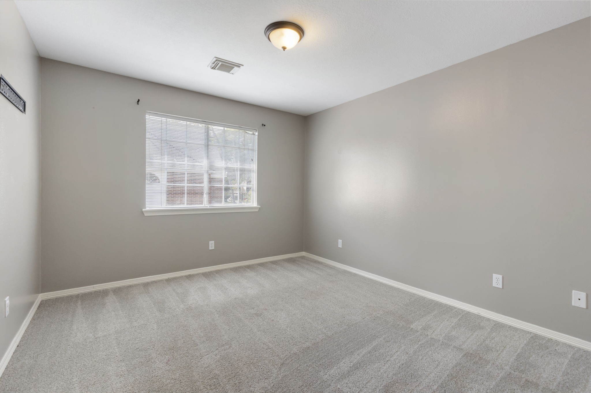 3427 Rolling Terrace Drive Spring, TX 77388 - Photo 28 of 36 an empty room with windows
