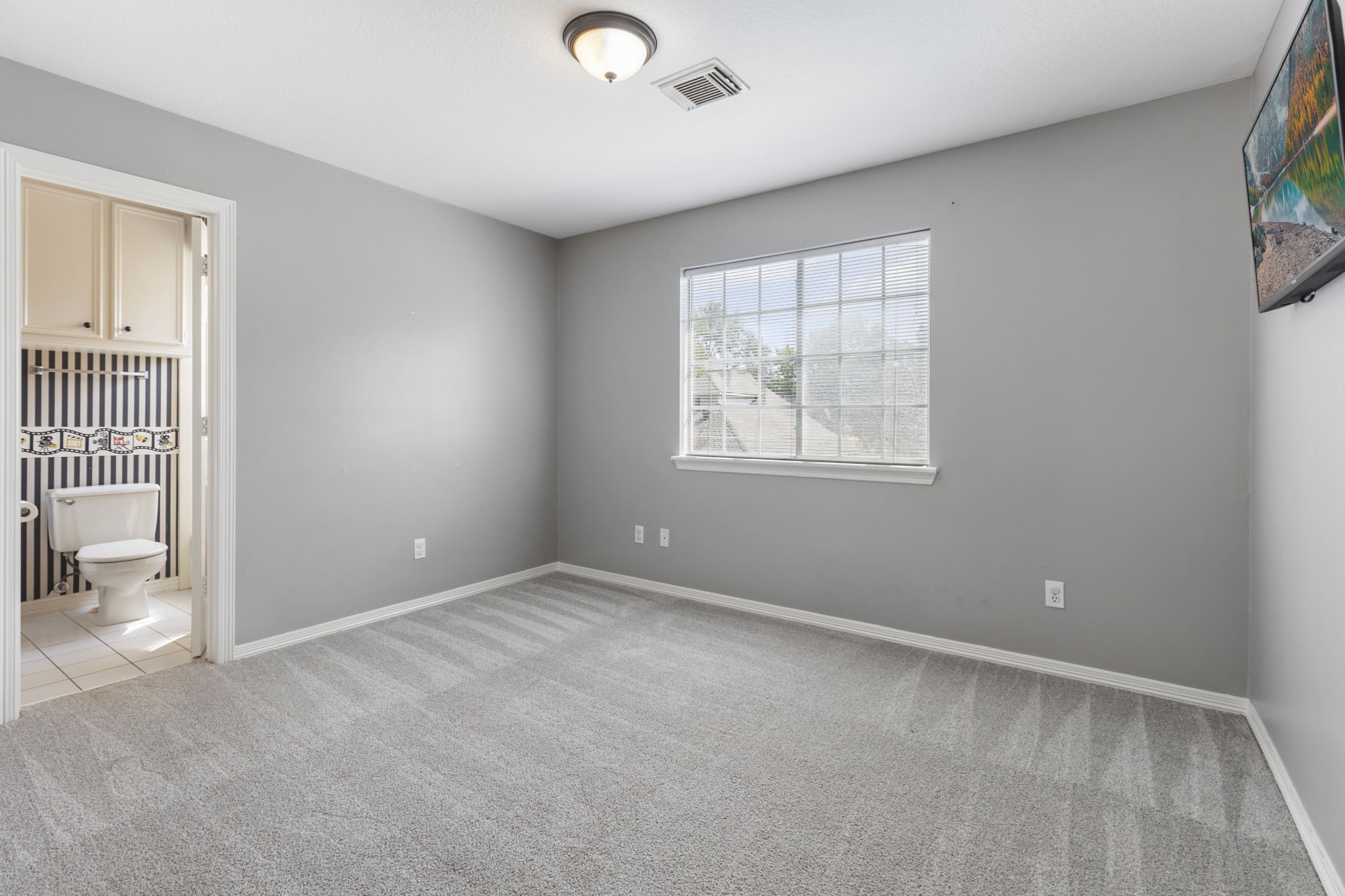 3427 Rolling Terrace Drive Spring, TX 77388 - Photo 29 of 36 an empty room with windows