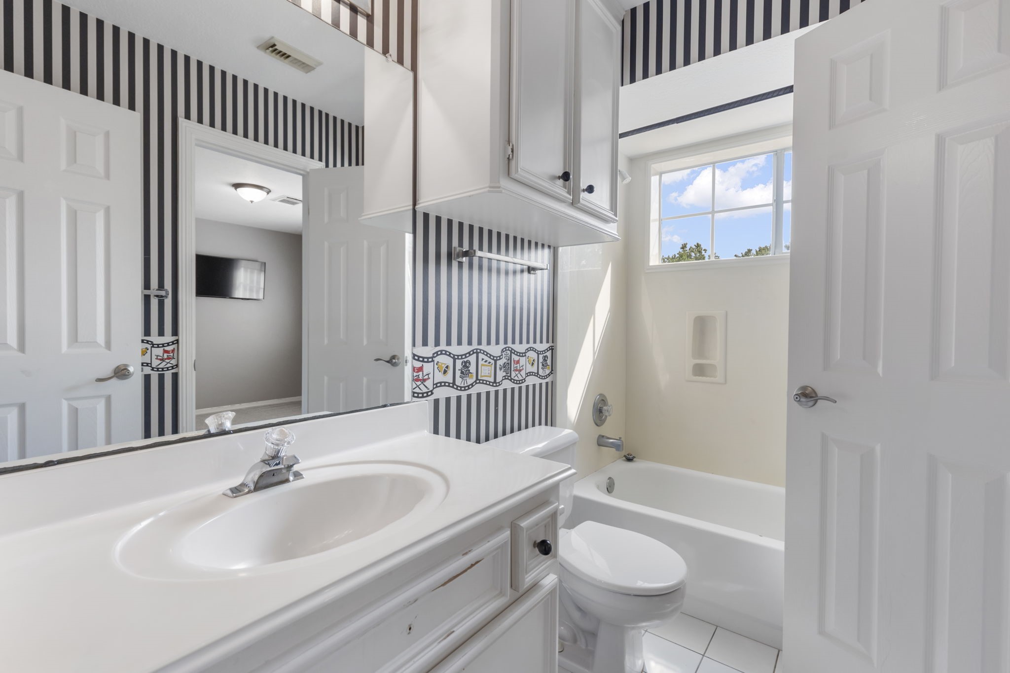 3427 Rolling Terrace Drive Spring, TX 77388 - Photo 30 of 36 a bathroom with a bathtub shower sink mirror and toilet