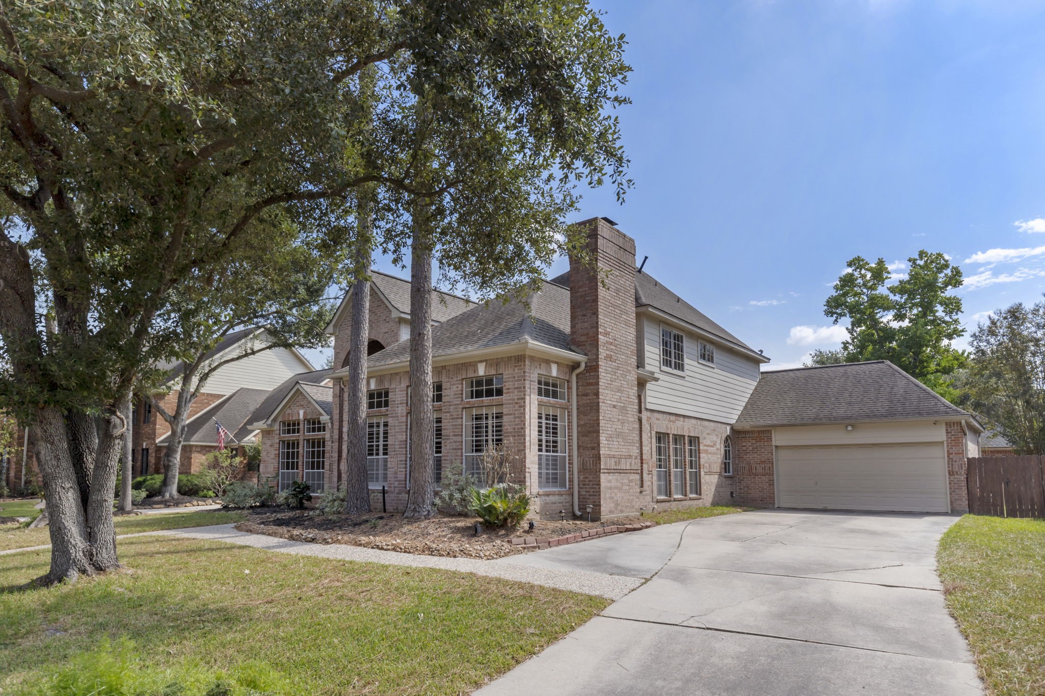3427 Rolling Terrace Drive Spring, TX 77388 - Photo 3 of 36 a front view of a house with a yard and garage
