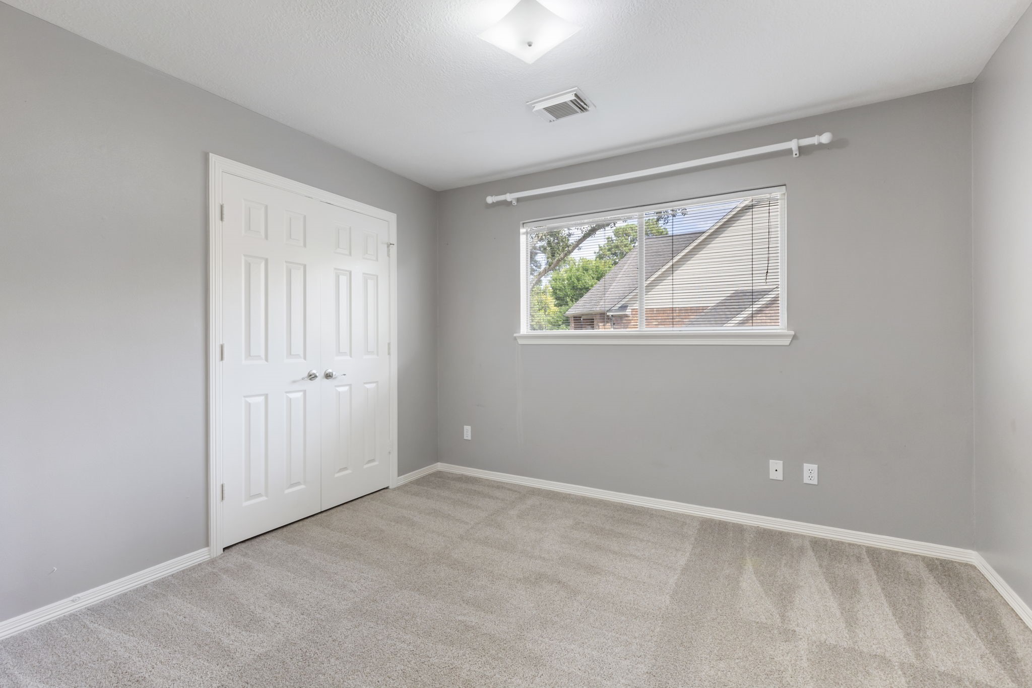 3427 Rolling Terrace Drive Spring, TX 77388 - Photo 31 of 36 an empty room with windows and closet