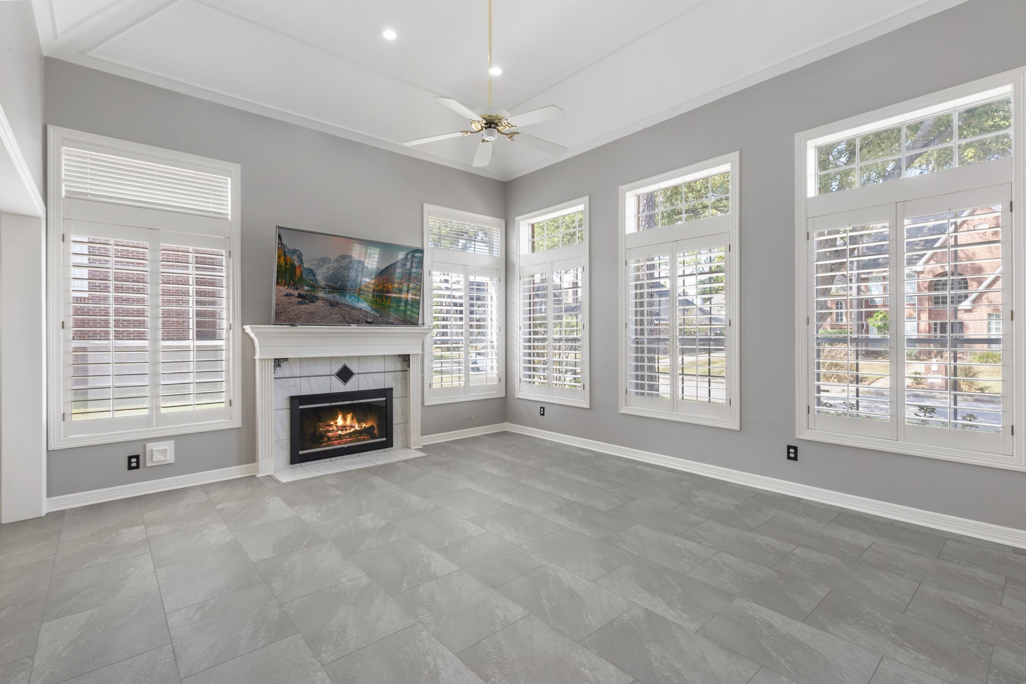 3427 Rolling Terrace Drive Spring, TX 77388 - Photo 6 of 36 a view of an empty room with a fireplace and a window