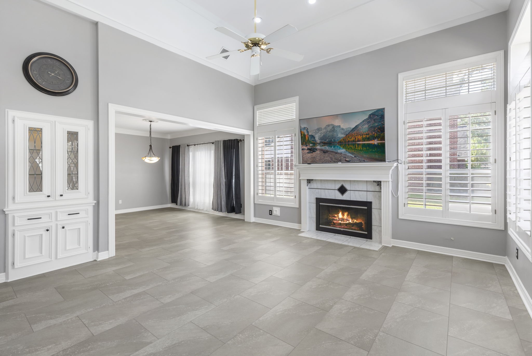 3427 Rolling Terrace Drive Spring, TX 77388 - Photo 7 of 36 a view of a livingroom with a fireplace dryer and chandelier