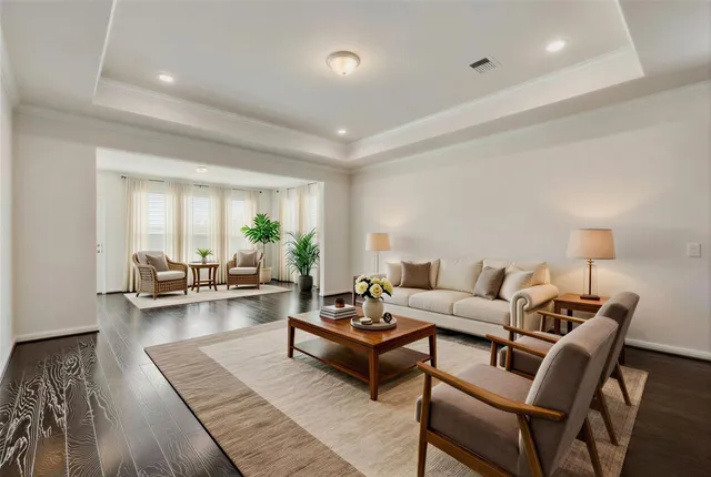 a living room with furniture and a couch