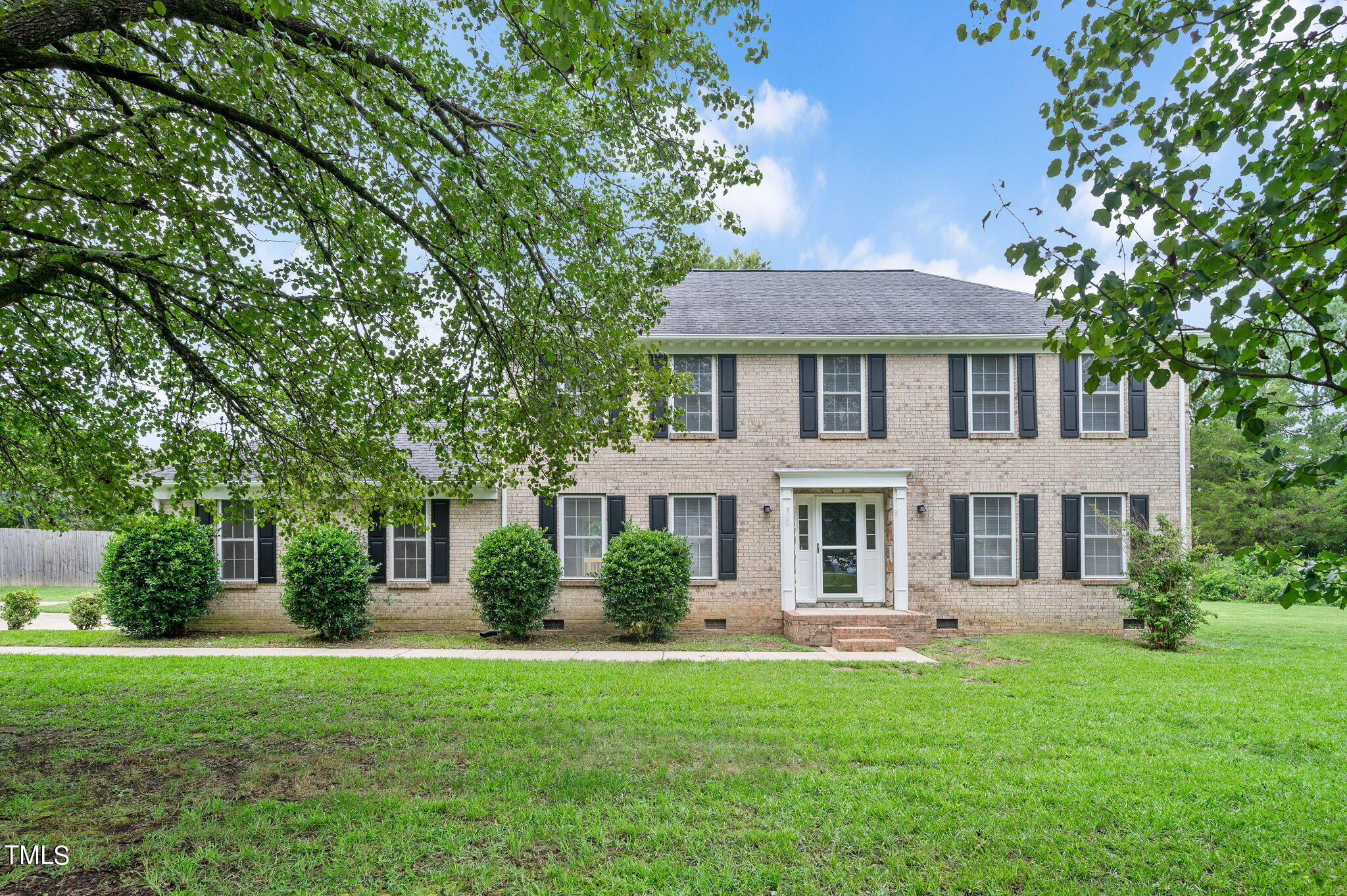 3912 Kildaire Farm Road Apex, NC 27539 - Photo 2 of 37 a front view of a house with a yard